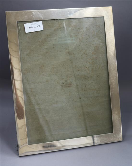 A George V silver mounted photograph frame, William Neale Ltd, Birmingham, 1912, 40.2cm.